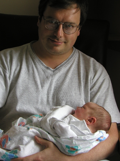 Me and my newborn 3rd son.  Issac Andrew.  Cute little bugger, in my completely unbiased opinion.